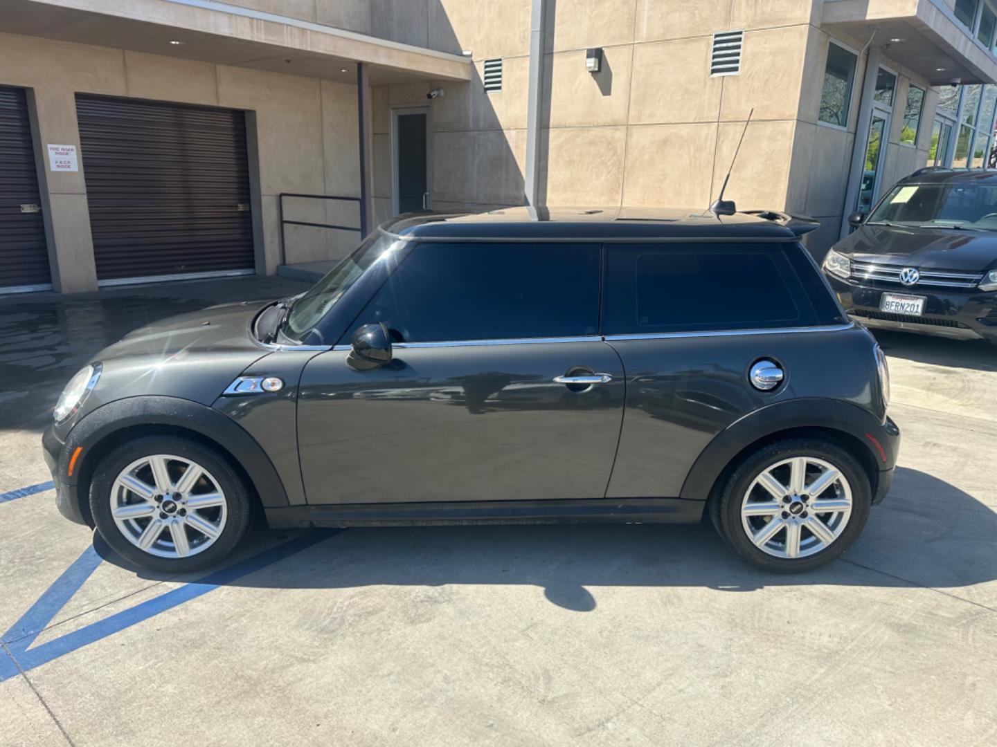 2012 Black /Black Mini Cooper Cloth (WMWSV3C52CT) with an 4Cylinder engine, Manual transmission, located at 30 S. Berkeley Avenue, Pasadena, CA, 91107, (626) 248-7567, 34.145447, -118.109398 - Tank : 13.20 Anti-Brake System : 4-Wheel ABS Steering Type : Rack and Pinion Front Brake Type : Disc Rear Brake Type : Disc Turning Diameter : 35.10 Front Suspension : Ind Rear Suspension : Ind Front Spring Type : Coil Rear Spring Type : Coil Tires : 195/55R16 Front Headroom : 38.80 Re - Photo#1